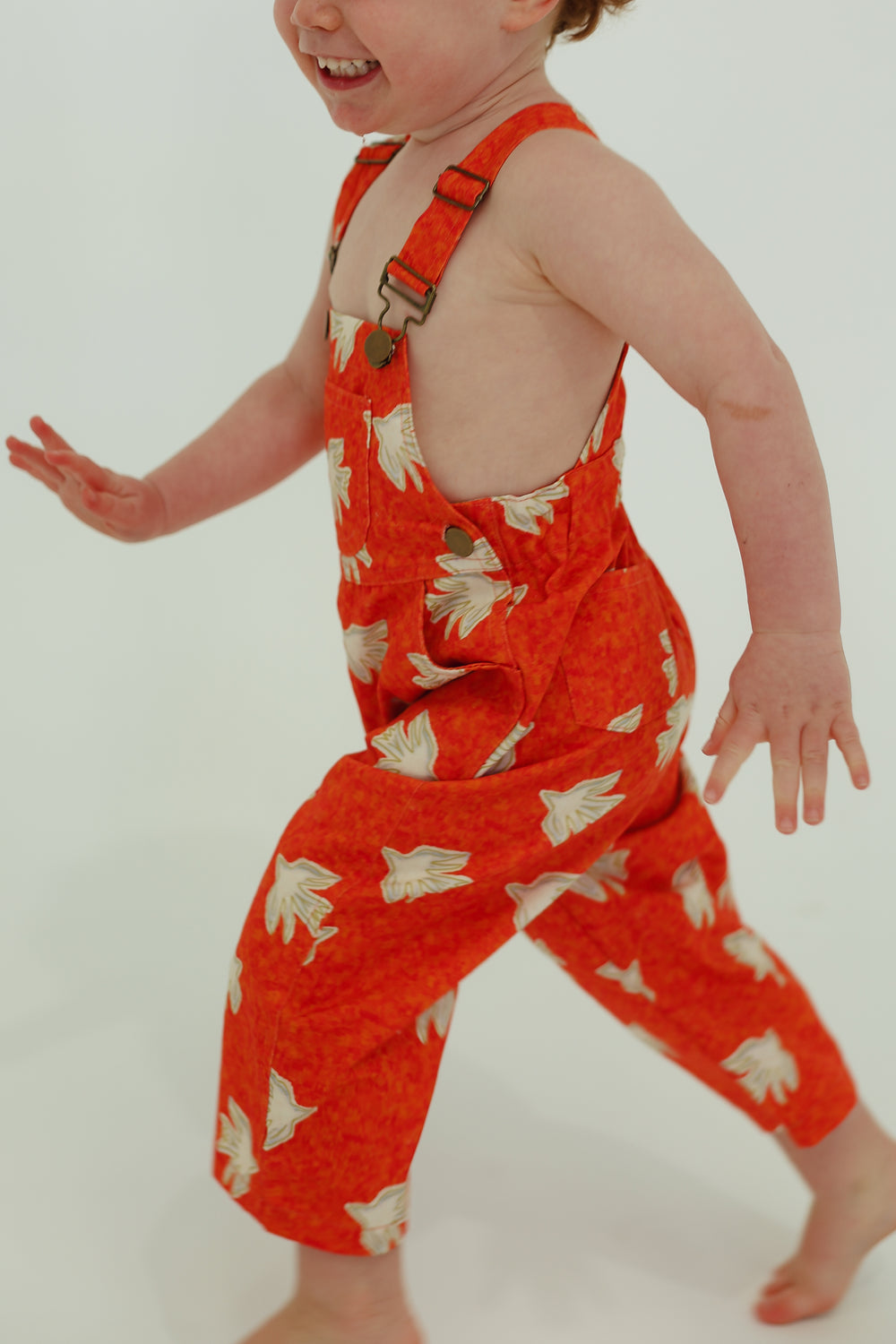 Le petit oiseau overalls