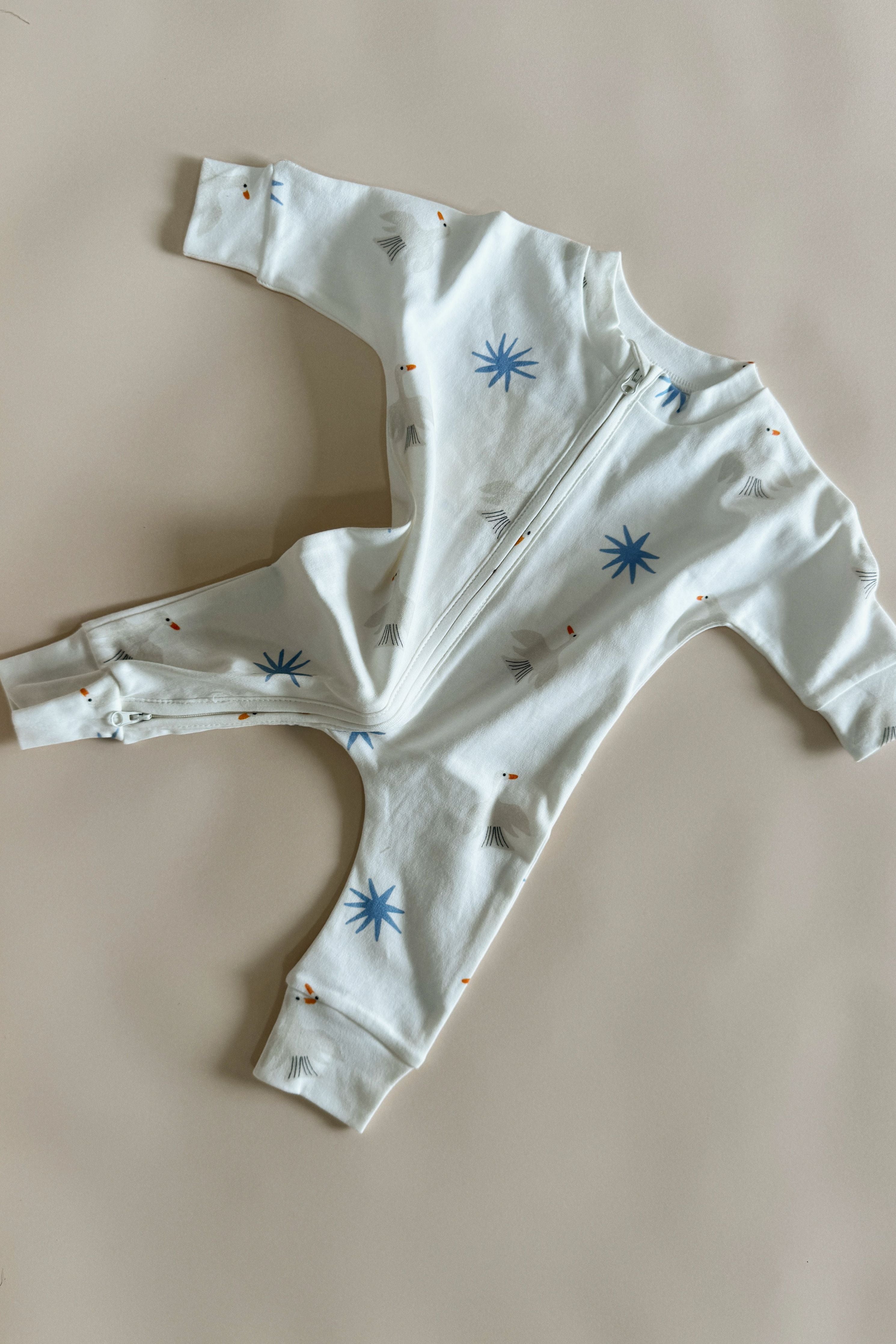 Organic cotton zip onesie - free